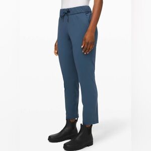 LULULEMON - On the Fly 7/8 pant in Code Blue. Size 14